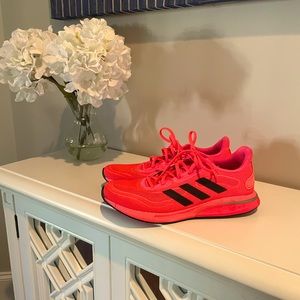 Women’s Adidas Supernova sneakers size 9.5 in color coral